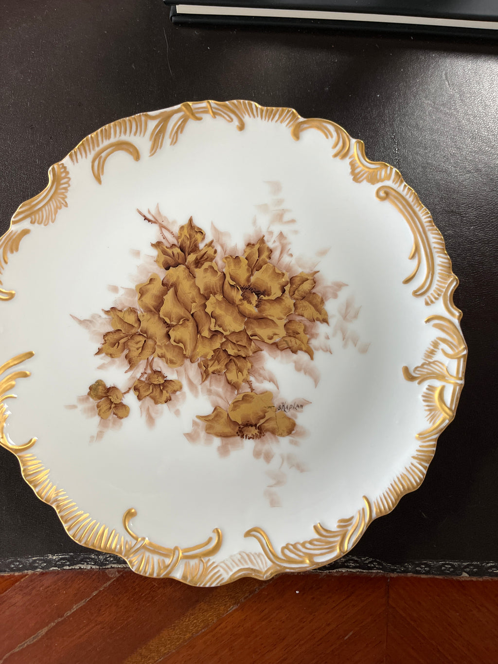 Artist-signed porcelain plate by Silvia Kaplan