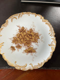 Artist-signed porcelain plate by Silvia Kaplan