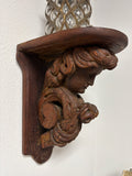 Antique Hand-carved Wooden Wall Shelf Featuring an Angel