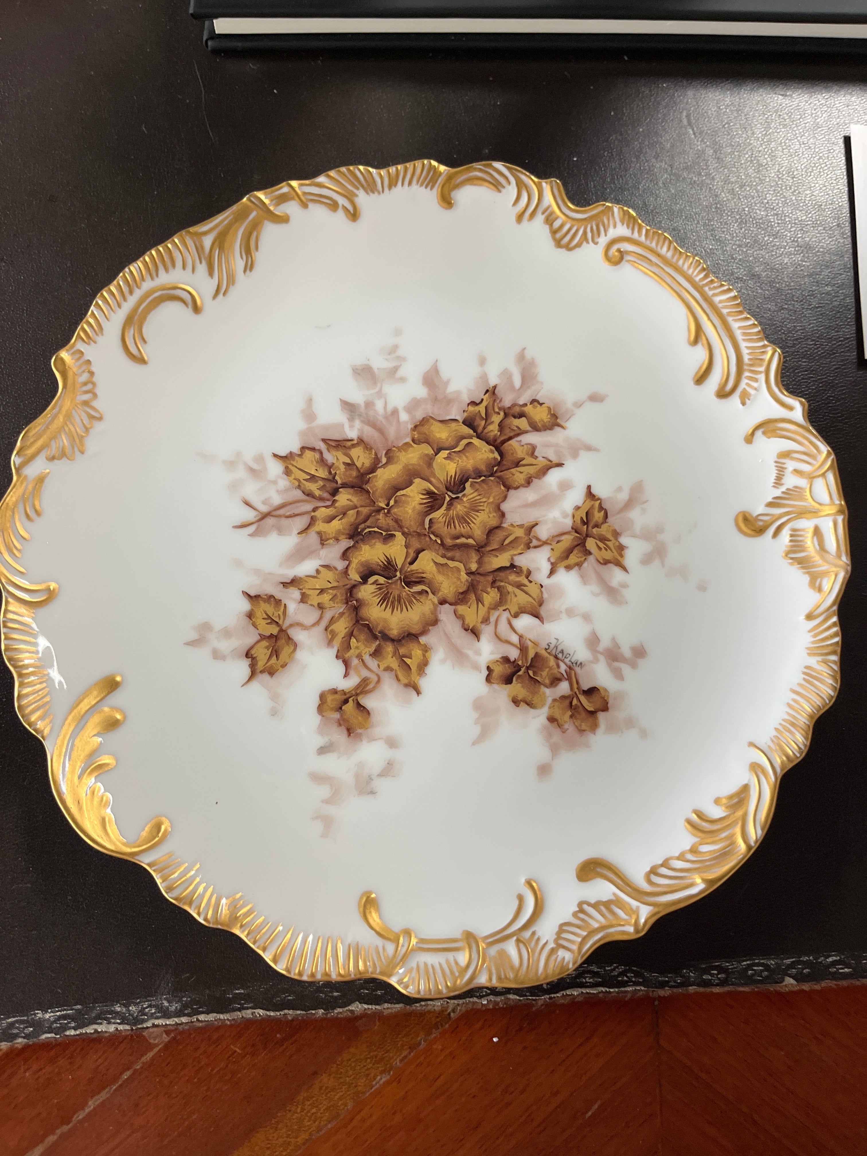 Artist-signed porcelain plate by Silvia Kaplan