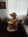 Goebel M.I. Hummel "Doll Bath" Figurine