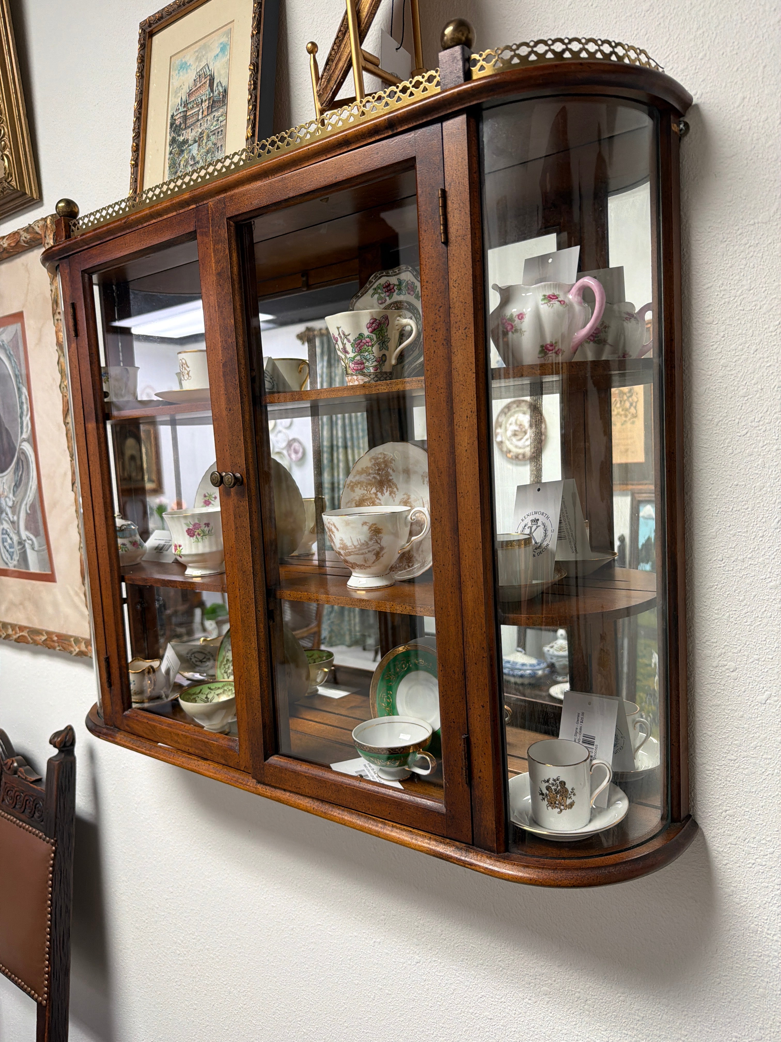 Wall-mounted Glads & Bronze Curio Cabinet